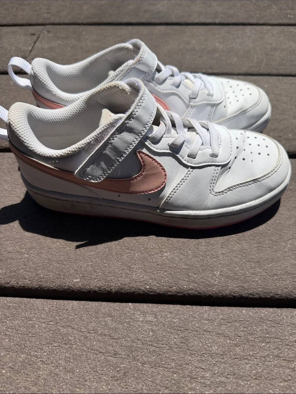 Youth size 1.5 Nike White Sneakers with Pink Swoosh Accent